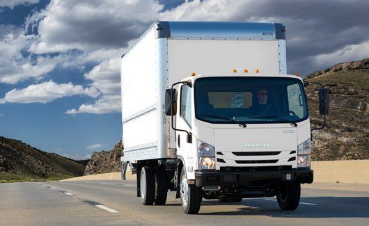 12-foot white truck on highway